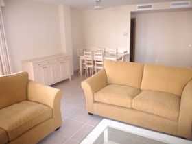 Lounge and dining area - click to enlarge to a larger high definition image - LAUNCHES IN A NEW POP UP WINDOW